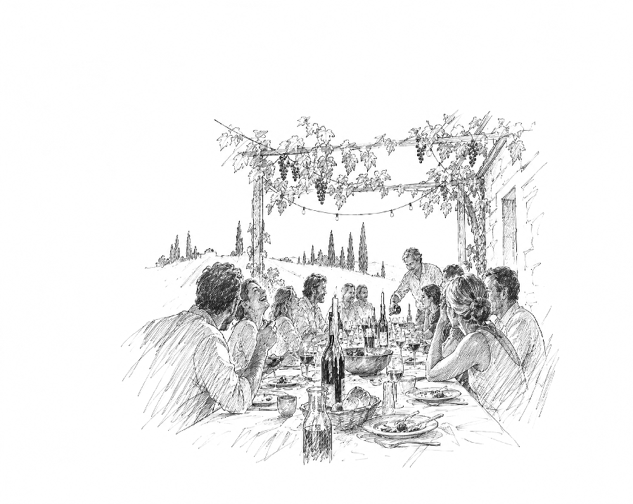 De lange tafel onder de pergola